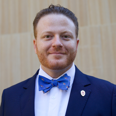 Headshot of B Dowling, a teaching assistant for TLA