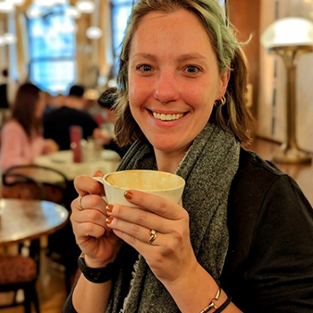 Haley Briel headshot with coffee